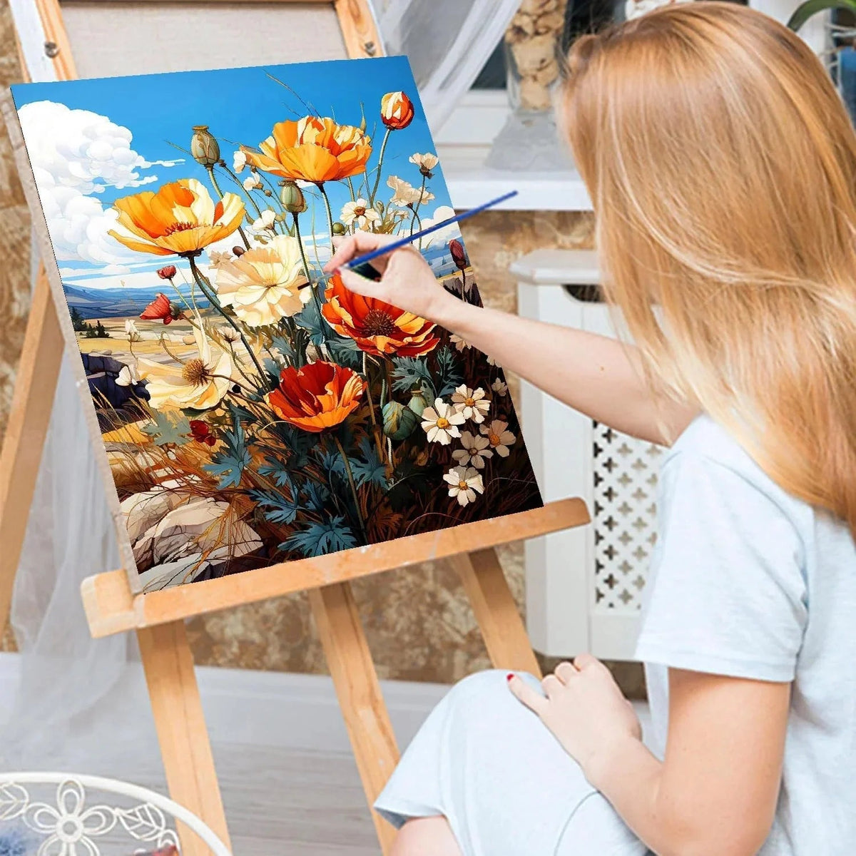 Woman painting a colorful floral paint by numbers kit on an easel.