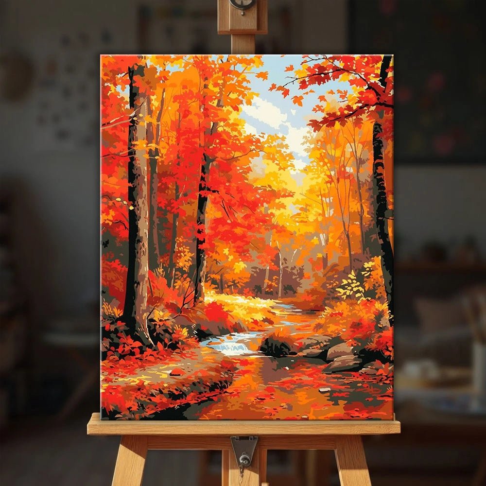 Autumn River Splendor paint by numbers kit displayed on easel with rich seasonal forest landscape