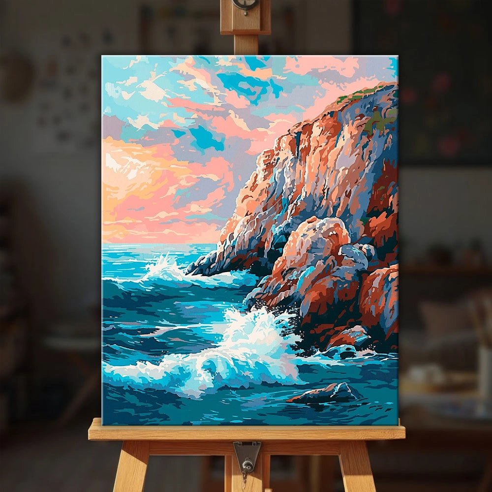 Crashing Tide Cliffs paint by numbers kit displayed on easel in a bright modern interior by Tinta Canvas