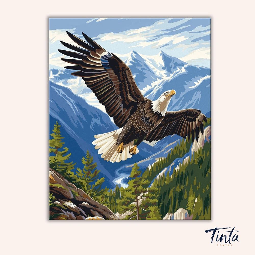 Eagle Flight paint by numbers kit artwork featuring a powerful eagle flying over a scenic mountain landscape by Tinta Canvas