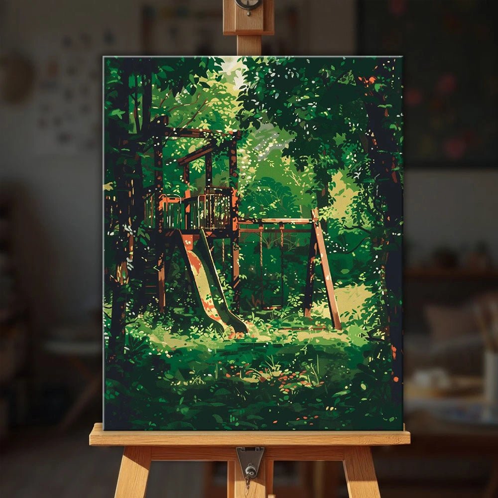 Echoes of Childhood paint by numbers kit displayed on an easel showing a peaceful playground slide beneath leafy trees by Tinta Canvas