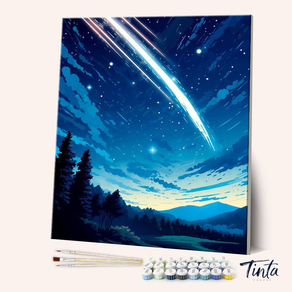 Angled view of Falling Star Night paint by numbers kit showing a glowing meteor streak across a deep blue sky by Tinta Canvas