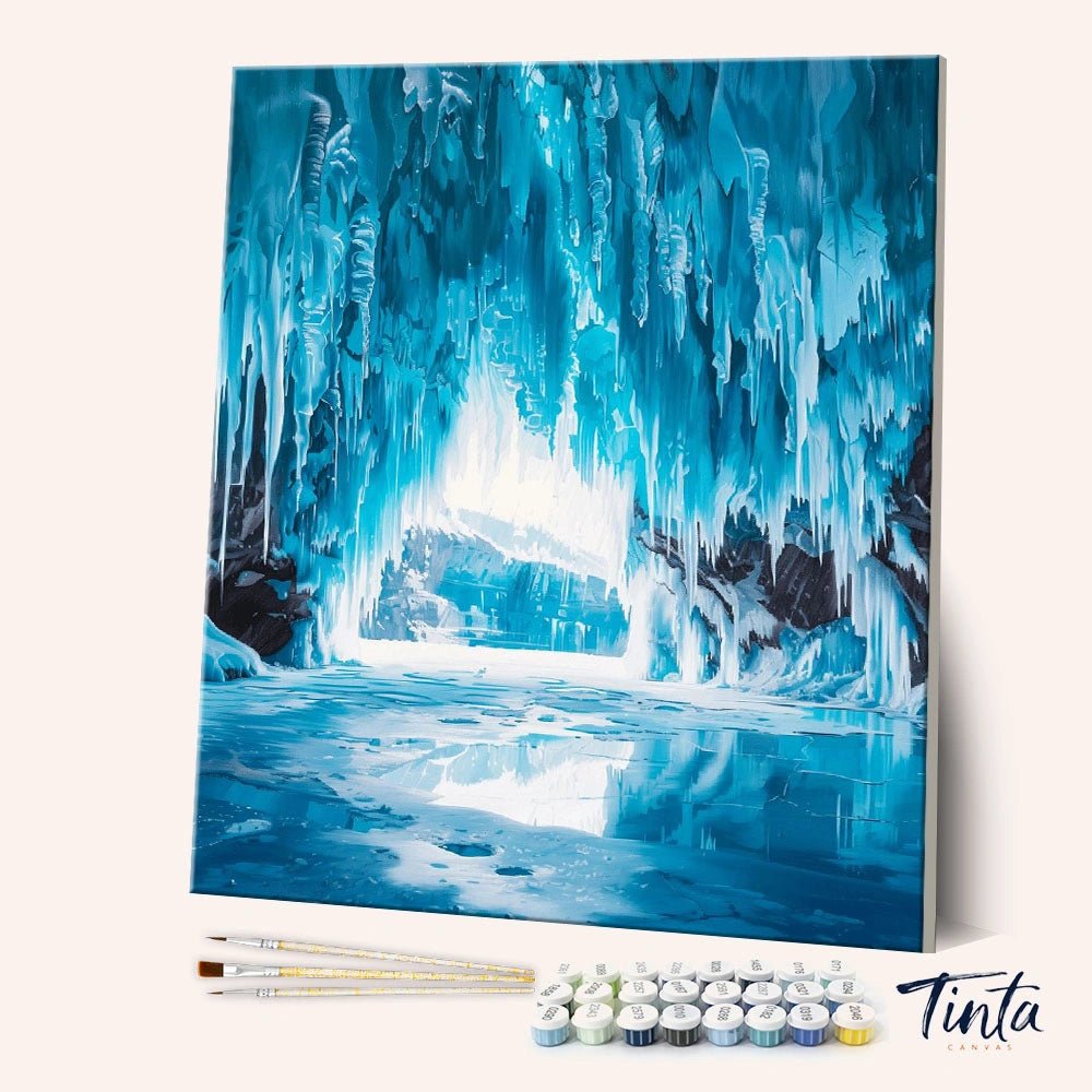 Angled view of Frozen Crystal Cavern paint by numbers kit featuring glowing icy cave with frozen waterfall by Tinta Canvas