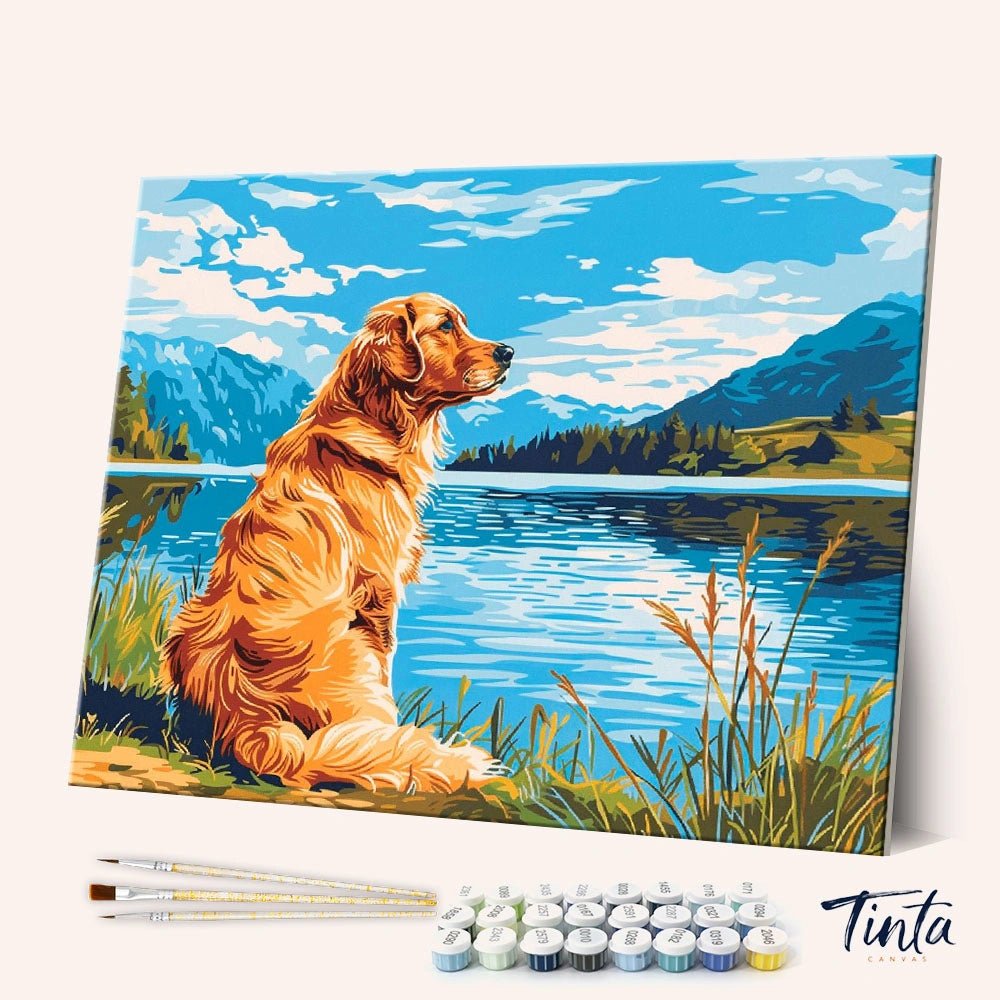 Golden Lake Watch paint by numbers kit angled display showing canvas, paint pots and brushes ready for painting by Tinta Canvas