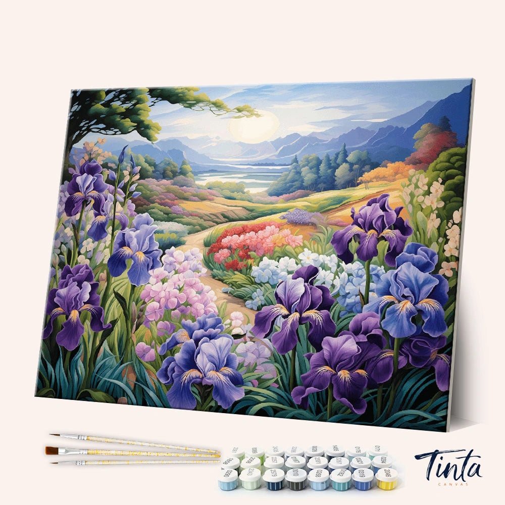 Angled display view of Iris Meadow Awakening paint by numbers kit featuring purple irises and colorful valley landscape by Tinta Canvas