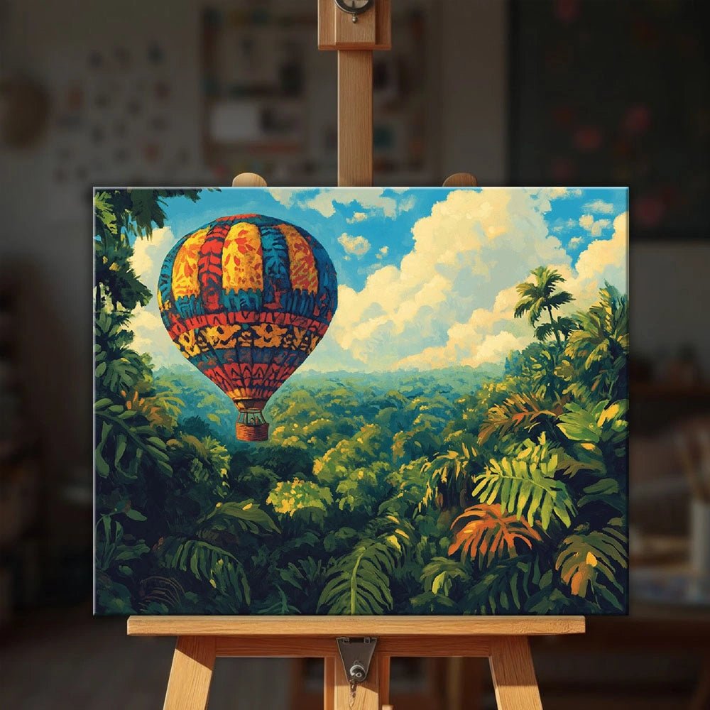 Jungle Drift Balloon paint by numbers kit displayed on easel with scenic rainforest and bright sky backdrop by Tinta Canvas