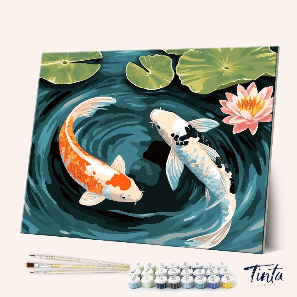 Angled display of Koi Harmony paint by numbers kit featuring two koi fish swirling in blue pond water by Tinta Canvas