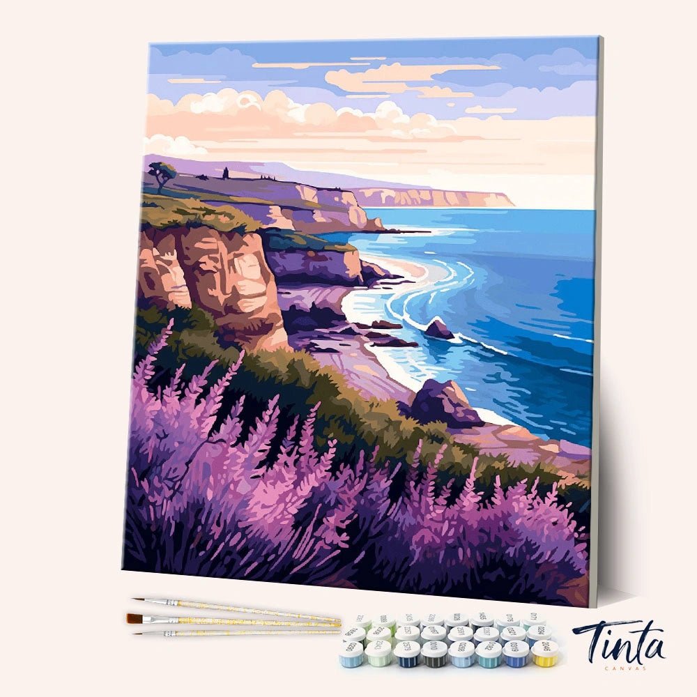 Angled view of Lavender Coastline Calm paint by numbers kit showing coastal cliffs and lavender fields by Tinta Canvas