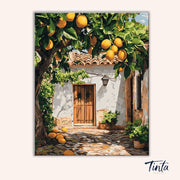 Clean artwork of Lemon Yard paint by numbers kit featuring a rustic white cottage under vibrant lemon trees by Tinta Canvas