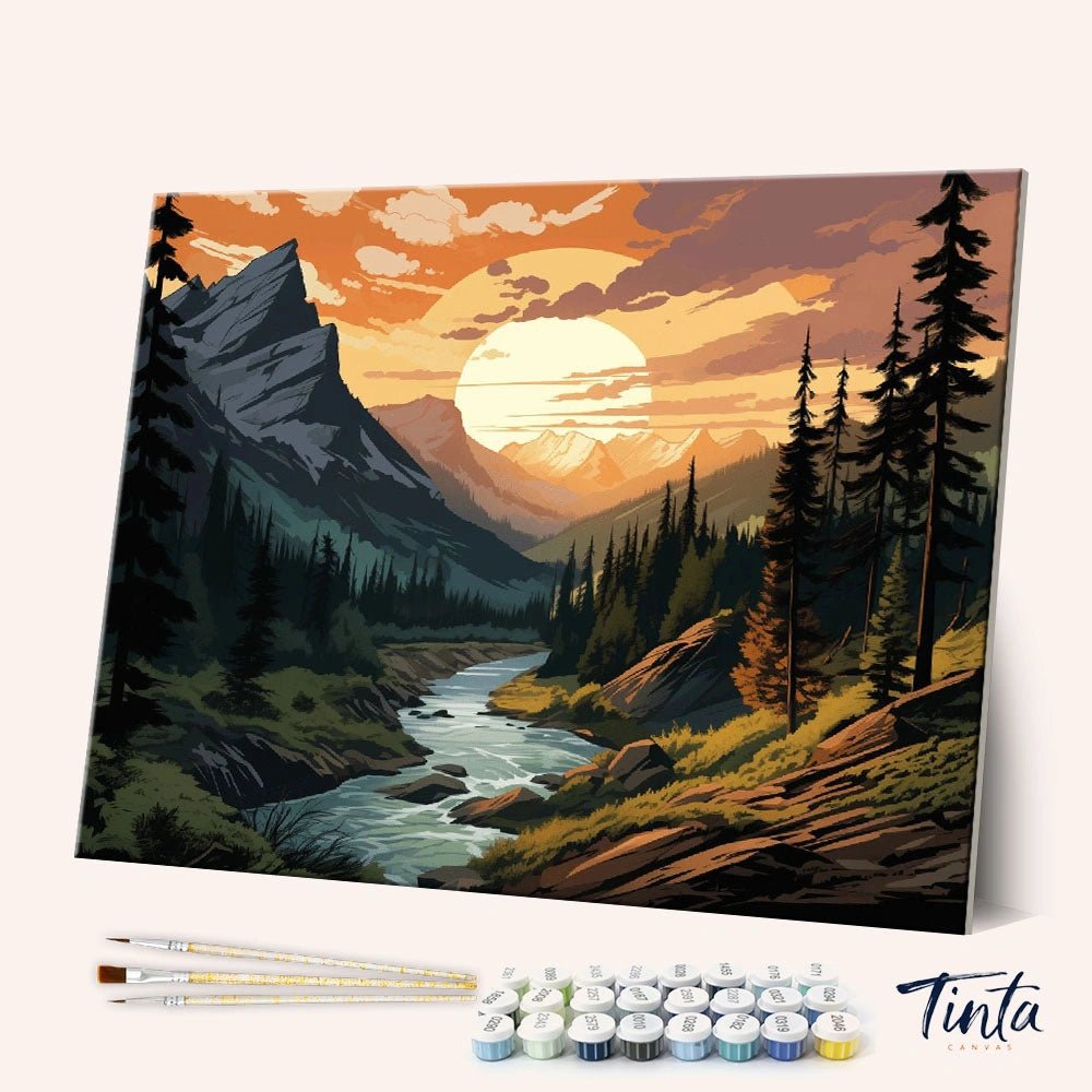 Angled display of the Mountain Landscape paint by numbers kit showing a sunset valley with river and pine trees by Tinta Canvas