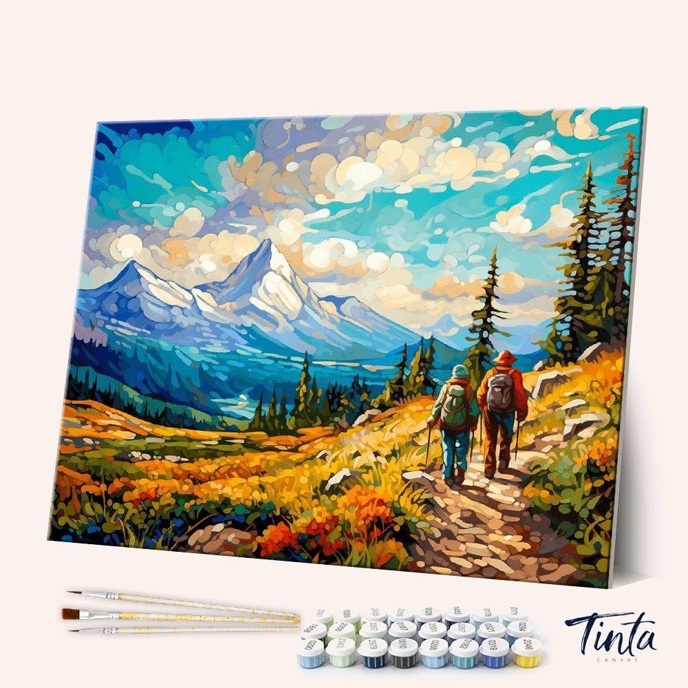 Angled display of the Mountain Trek paint by numbers kit showing hikers walking along a colorful alpine trail by Tinta Canvas