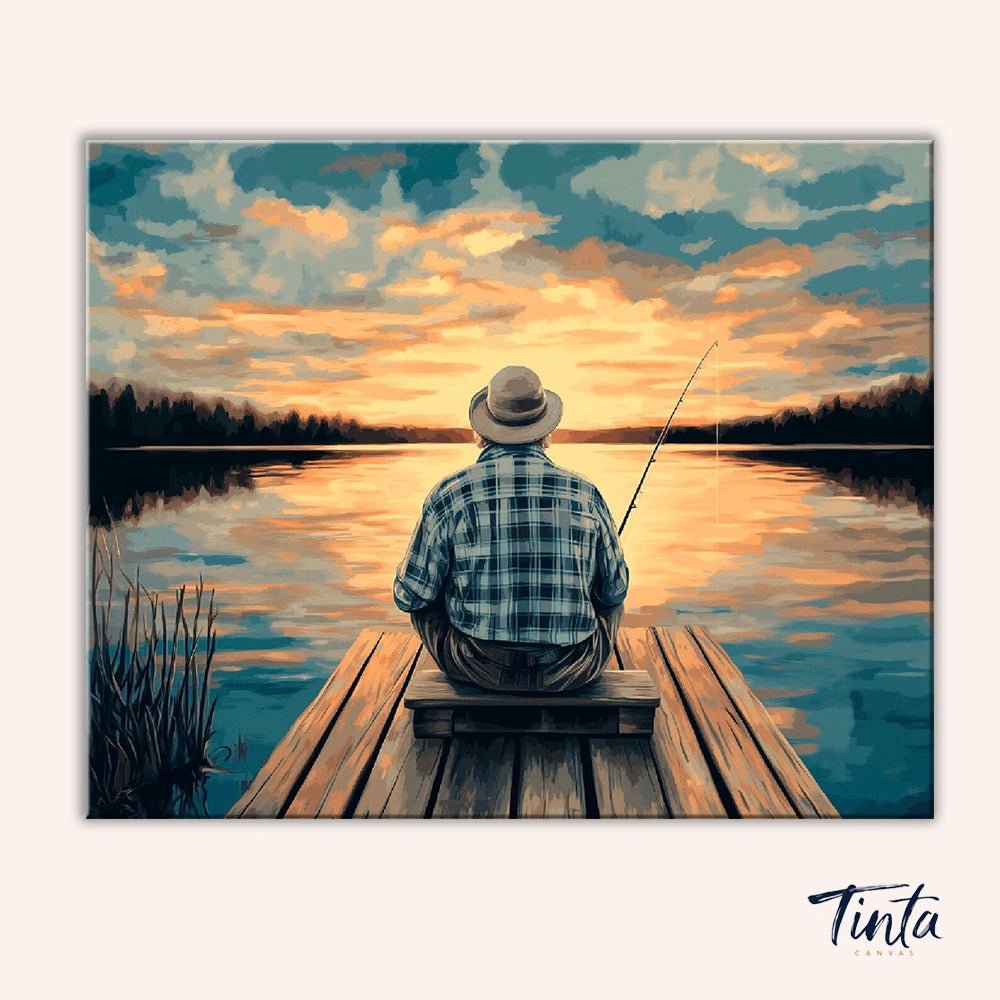 Clean artwork of the Old Man’s Hobby paint by numbers kit featuring a man fishing peacefully by a calm lake at sunset by Tinta Canvas