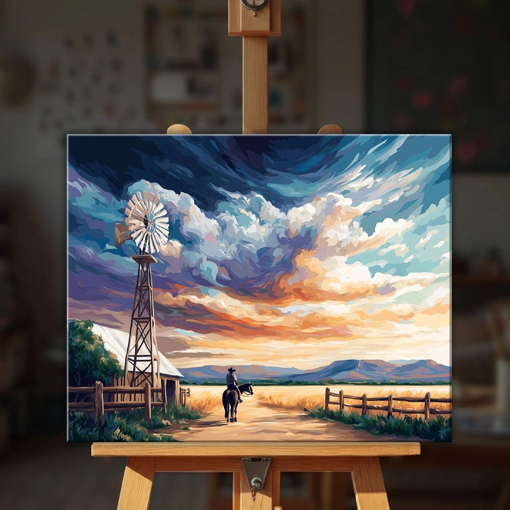 Rancher Days paint by numbers kit displayed on easel in cozy interior highlighting rustic countryside scene and warm sunset tones by Tinta Canvas