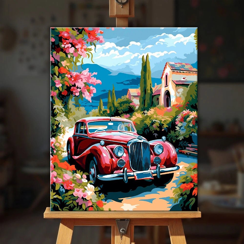 Riviera Rose Drive paint by numbers kit displayed on easel in bright interior with colorful coastal scene by Tinta Canvas