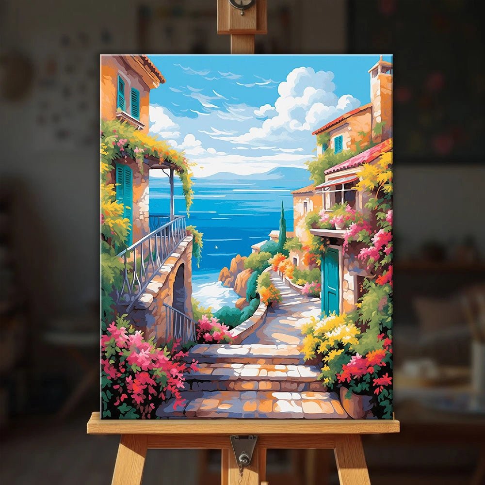Seaside Blossom Path paint by numbers kit displayed on easel in a bright coastal inspired room by Tinta Canvas