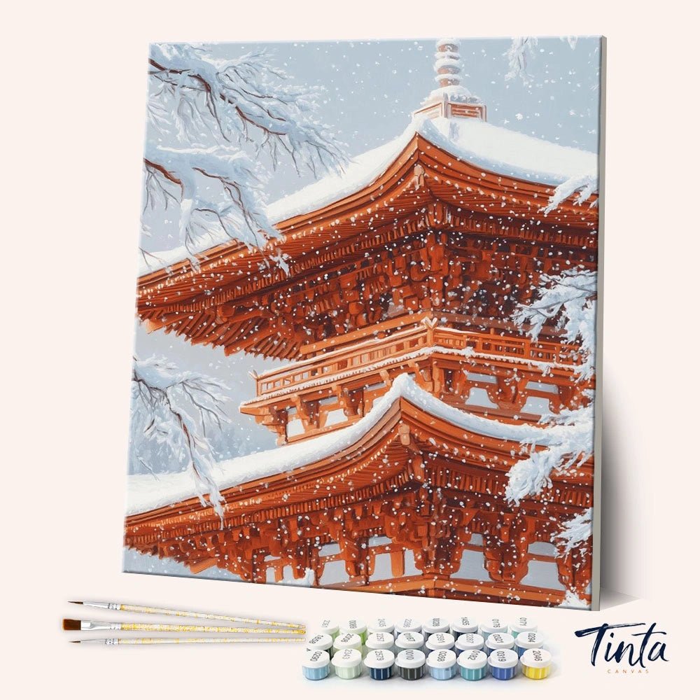 Snow Kissed Pagoda paint by numbers kit angled view showing snow-covered pagoda with delicate falling snow