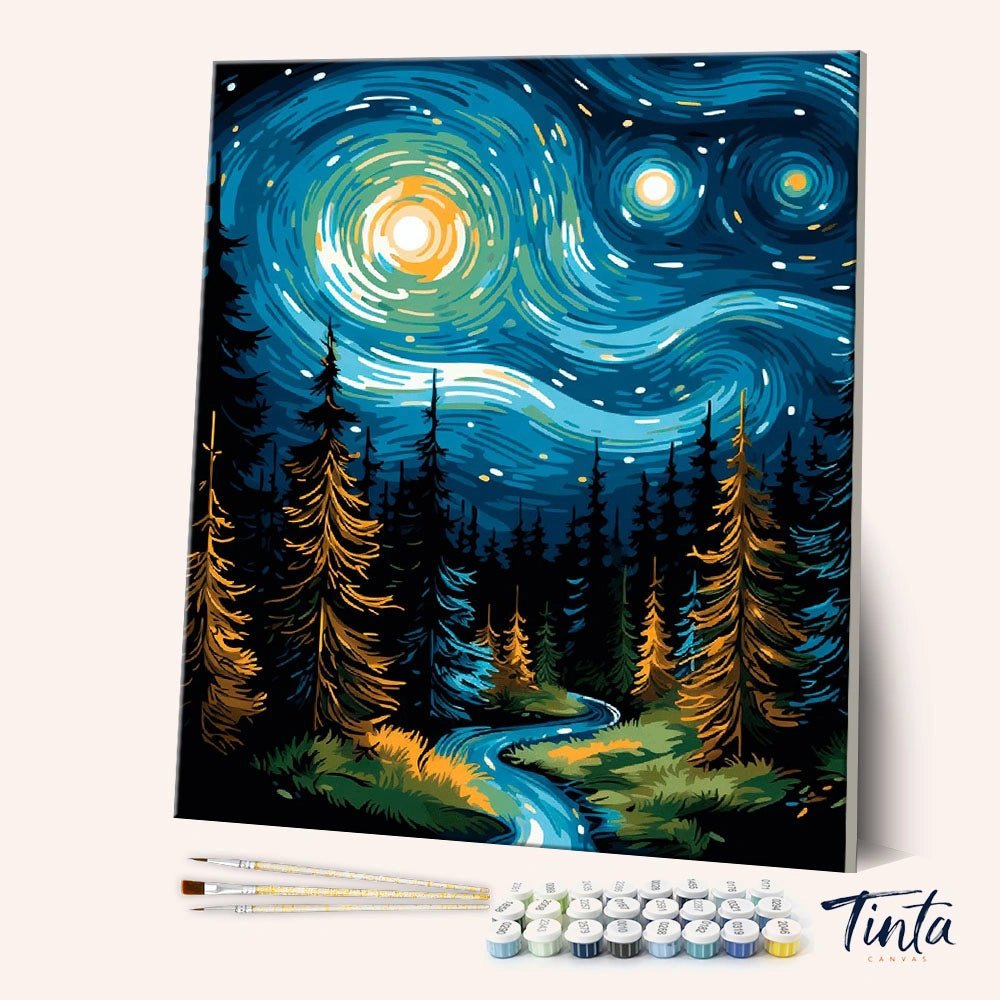 Angled display of the Starflow Forest paint by numbers kit showing swirling stars above a glowing forest path by Tinta Canvas
