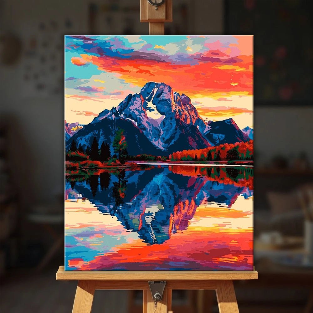Still as the Mountain paint by numbers kit displayed on an easel in a cozy interior setting by Tinta Canvas