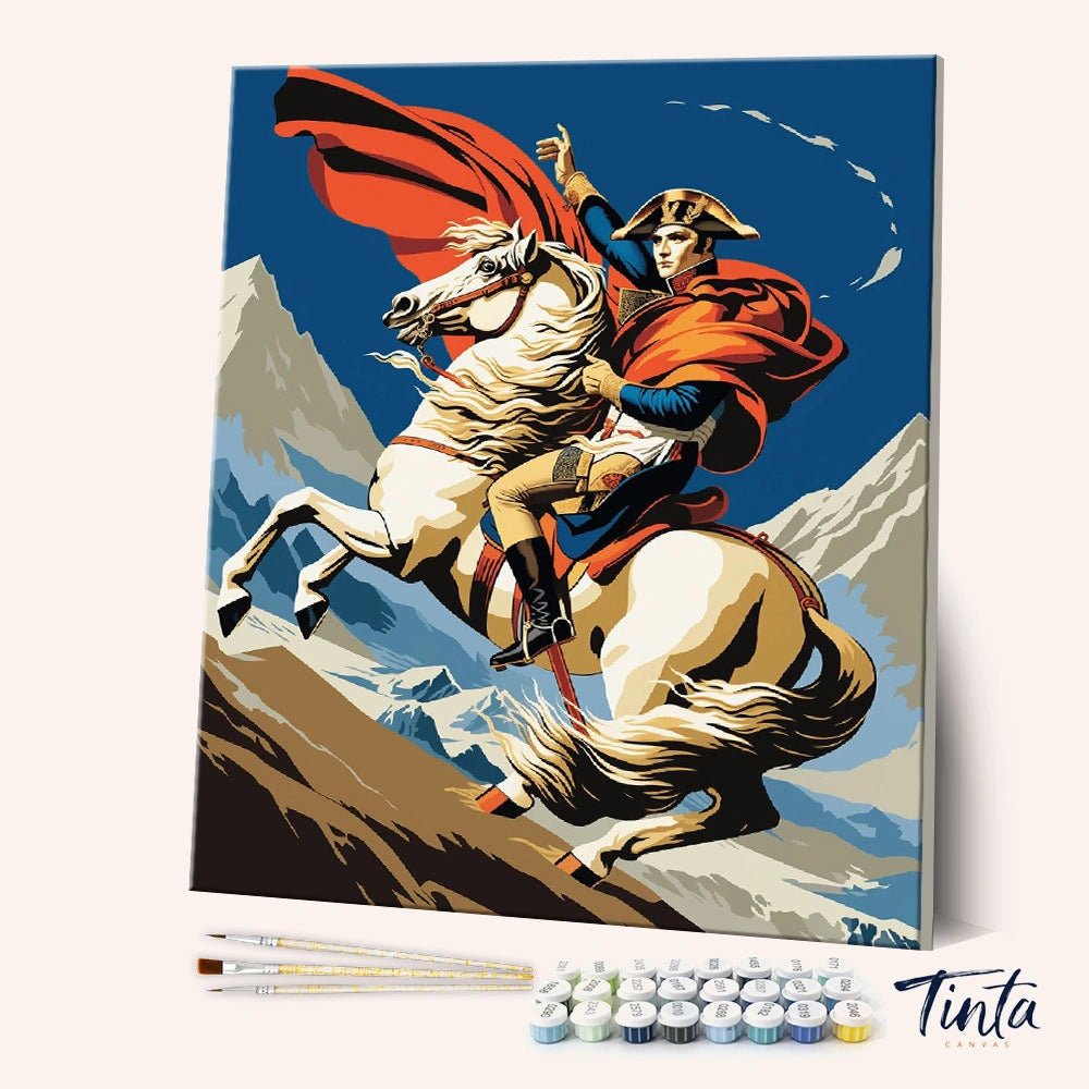 Angled display of The French Emperor paint by numbers kit showing Napoleon riding a white horse with a flowing red cape by Tinta Canvas