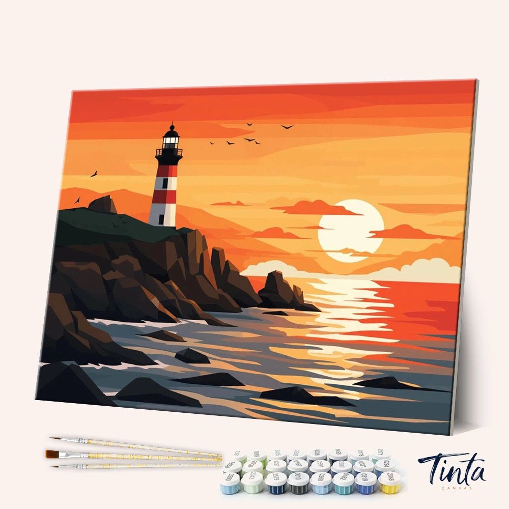 Western Lighthouse paint by numbers kit shown in angled view with sunset sky, ocean waves, and rocky cliffs