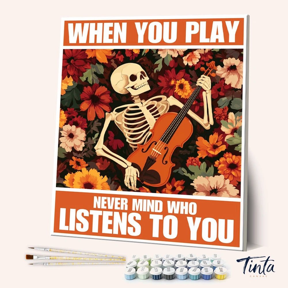 Who Listens to You paint by numbers kit shown in angled view with skeleton playing violin and colorful flowers