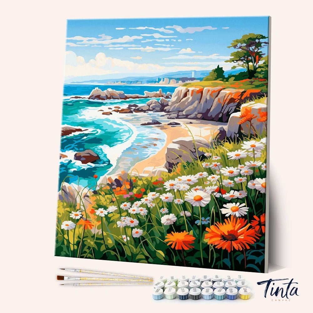 Angled view of Wildflower Coast Retreat paint by numbers kit with bright coastal blooms and turquoise sea by Tinta Canvas
