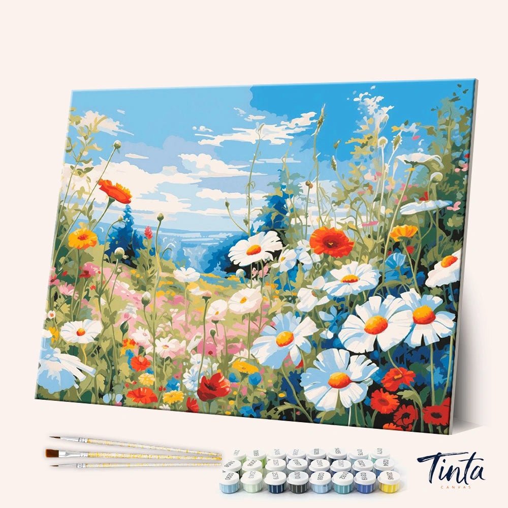 Wildflower Meadow paint by numbers kit shown in angled view with colorful flowers and bright blue sky