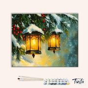 Clean artwork of Winter Lanterns paint by numbers kit featuring warm lights, snow, and festive evergreen details